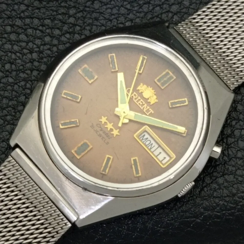 Vintage 1974 Orient Automatic Mens Silver Watch W/daydate & Gold accents
